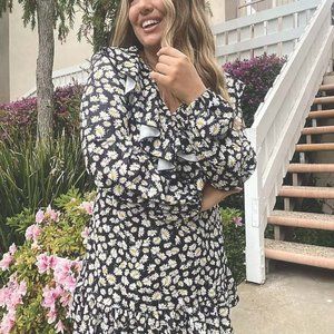 ASOS DESIGN Curve mini wrap dress with frill neck and pep hem in black daisy